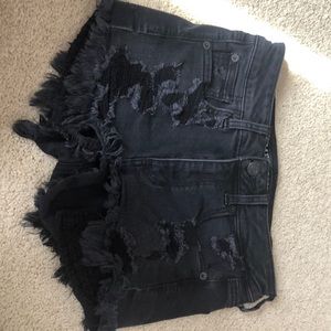 Black distressed American Eagle shorts